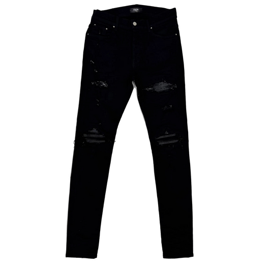 Amiri MX1 Distressed Black Patch Jeans (Pre-Owned)