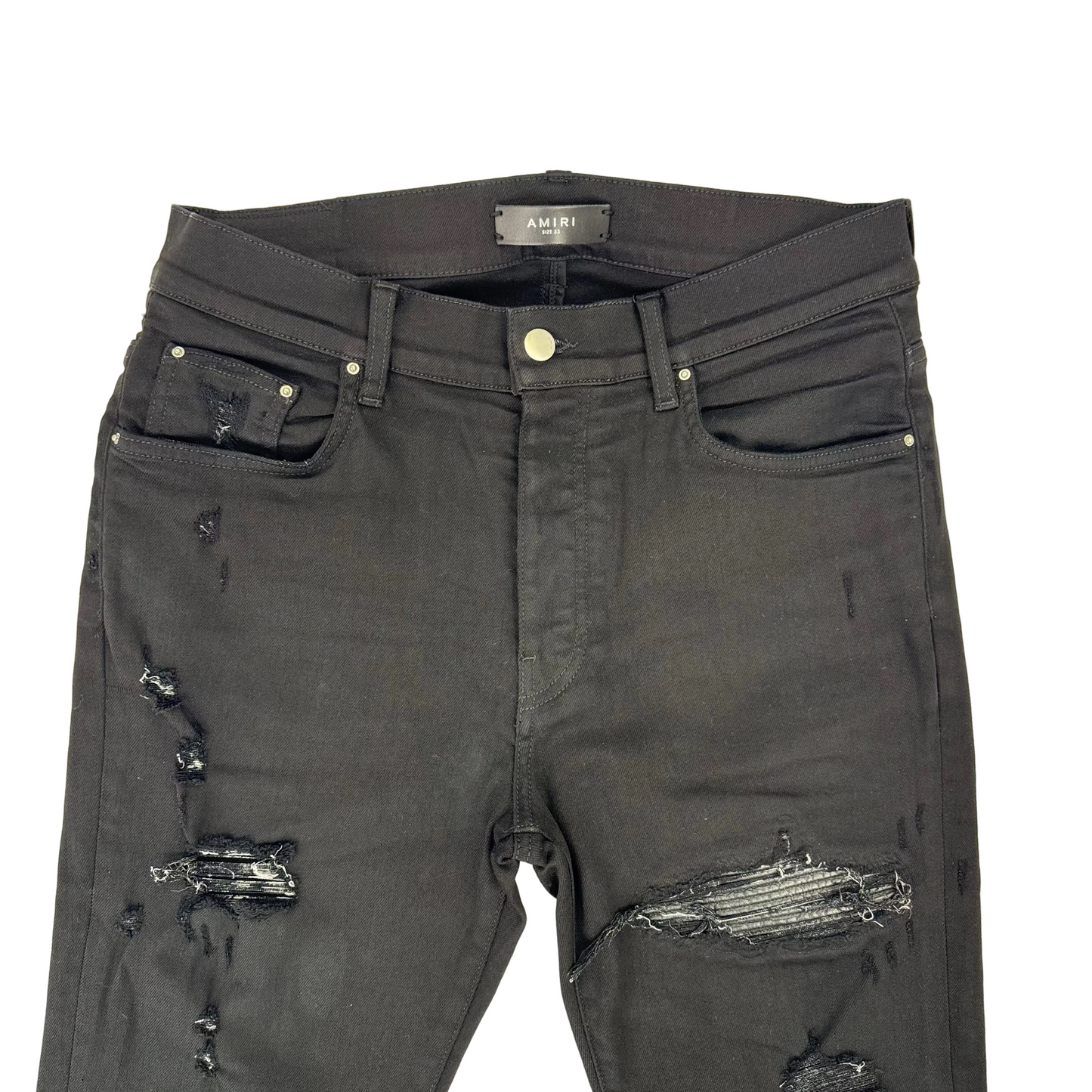 Amiri MX1 Distressed Black Patch Jeans (Pre-Owned)