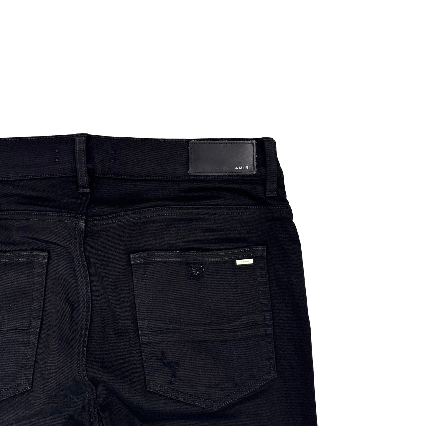 Amiri MX1 Distressed Black Patch Jeans (Pre-Owned)